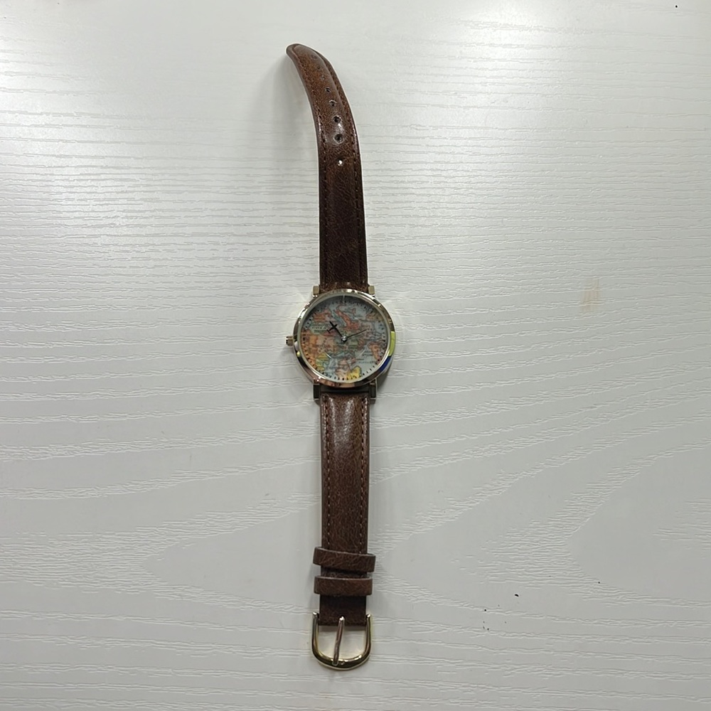 World map unisex watch with an airplane as the hands! Perfect for a traveler!